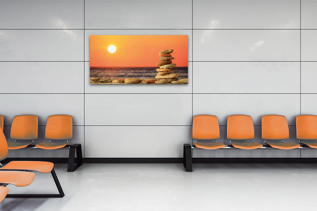 Waiting room with orange seat shells, an acoustic picture hangs on the wall soni PICTURE