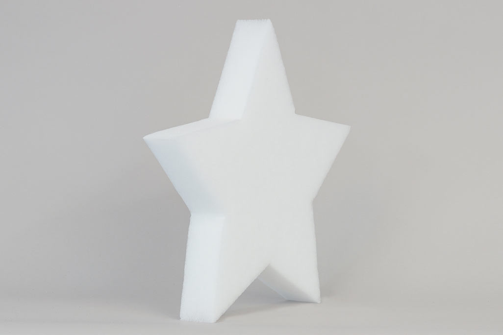 Schallabsorber in Form eines Sterns (soni ELEMENT STAR) in der Farbe Weiß vor grauem Hintergrund diagonal fotografiert