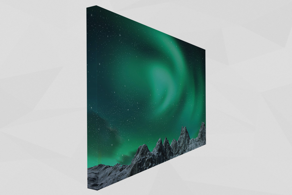 Tableau acoustique soni PICTURE polar lights montre une aurore boréale époustouflante au-dessus de montagnes majestueuses dans le ciel nocturne.