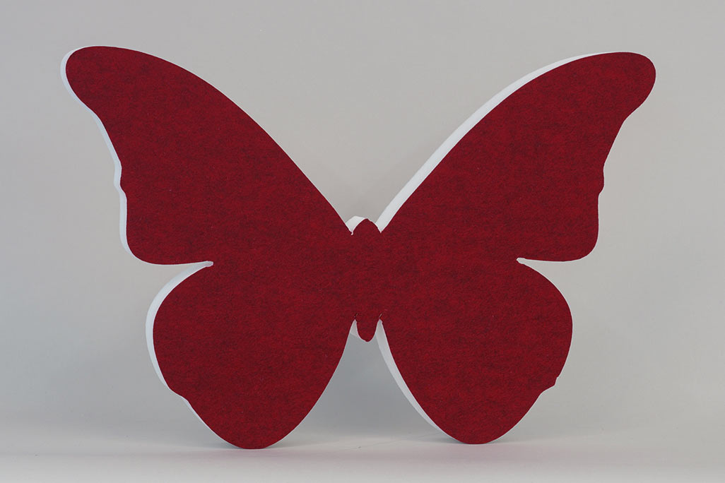 Sound absorber in the shape of a butterfly (soni ELEMENT Butterfly) in the color red against a grey background