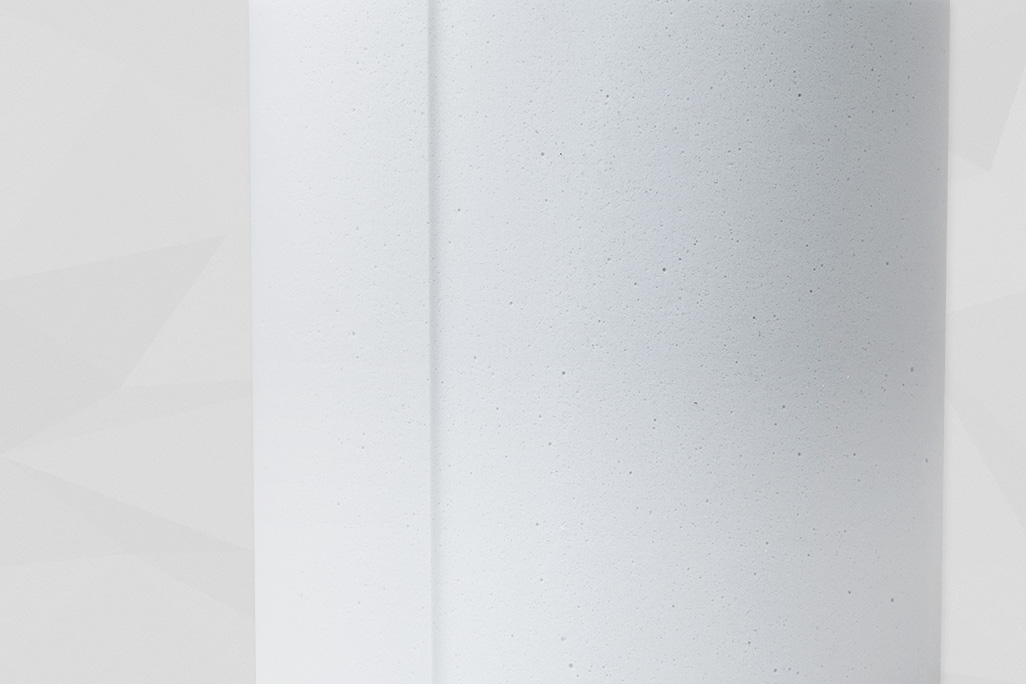 Nahaufnahme einer Schnittkante des Melaminzylinders